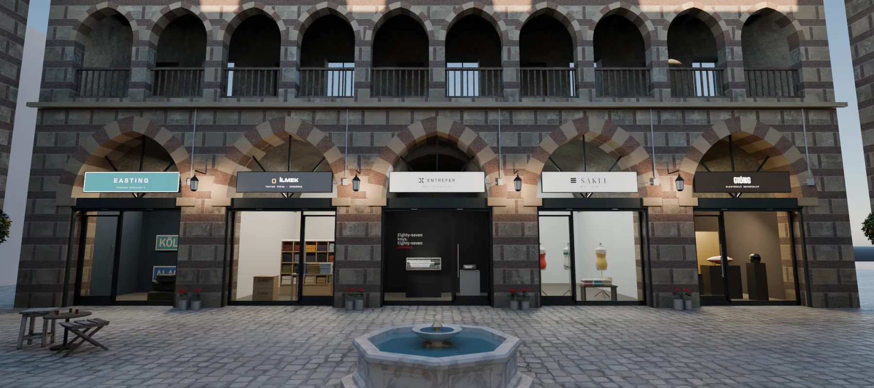 The inner court of KUBİLAY HAN, seen from the end of the passage: five more shops open in its arcade.